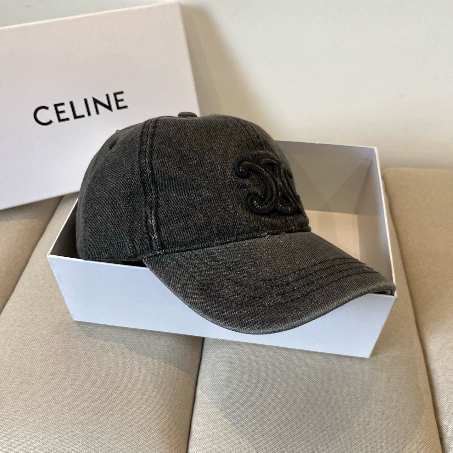 Washed black cotton cap with tonal embroidered emblem